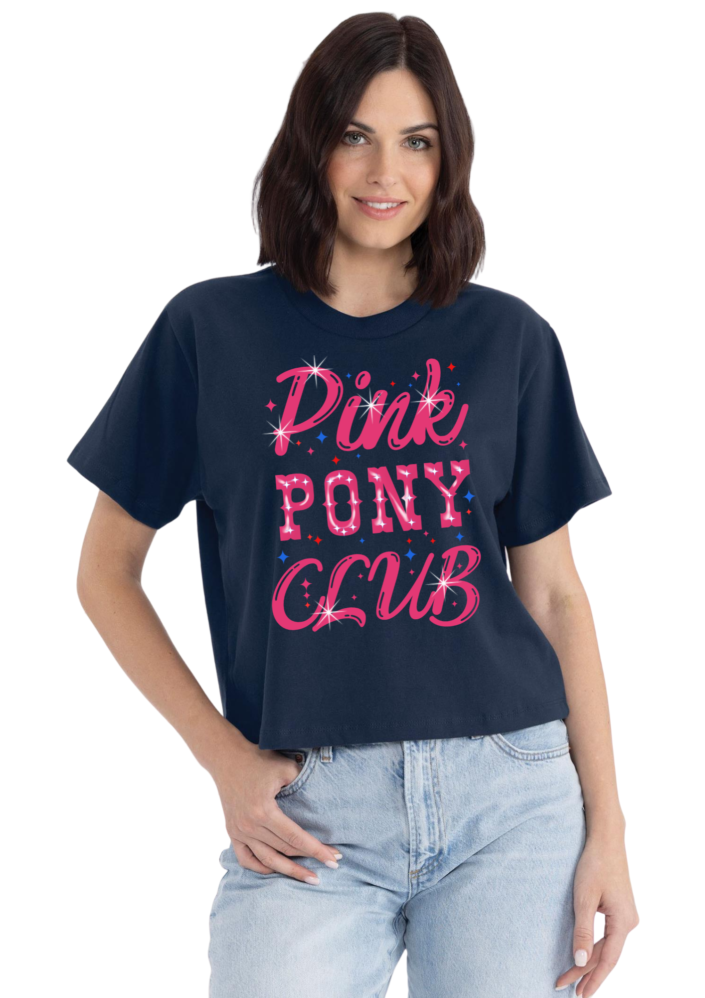 Woman wearing a navy blue t-shirt with 'Pink Pony Club' text, standing against a colorful patterned background.