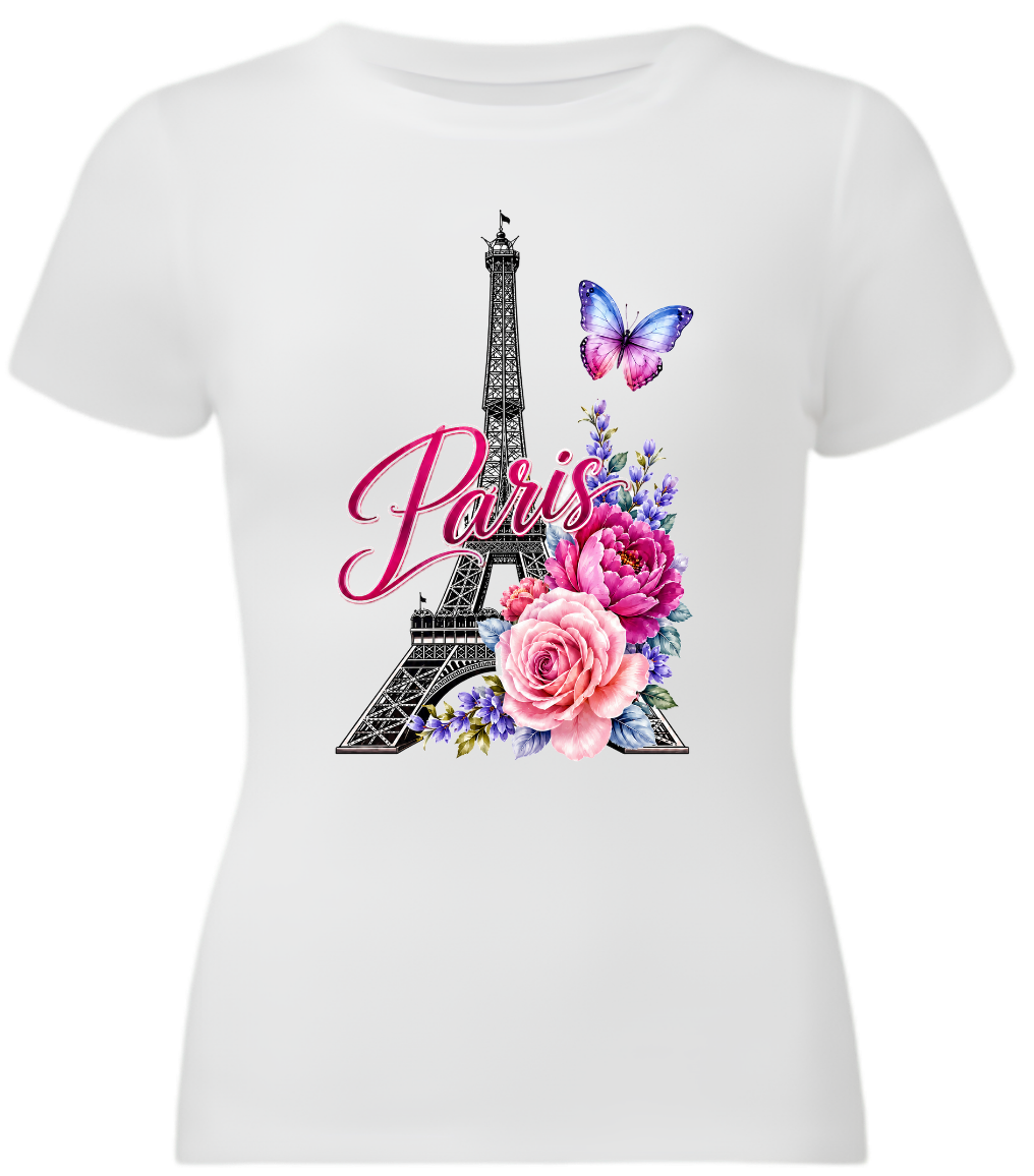 White short-sleeve crewneck t-shirt featuring a Paris-themed graphic print with the Eiffel Tower, pink script 'Paris', pink and purple flowers, and a butterfly.