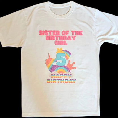 A white t-shirt with a colorful 'Pop It' design and text celebrating a birthday, featuring the number 5 and the phrase 'Sister of the Birthday Girl'.